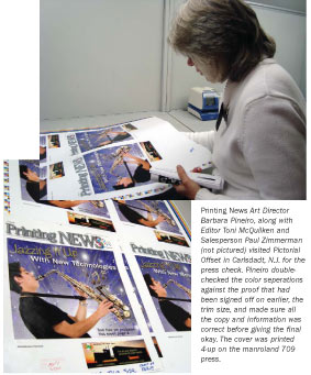 Art Director Barb Pinero examines the cover.